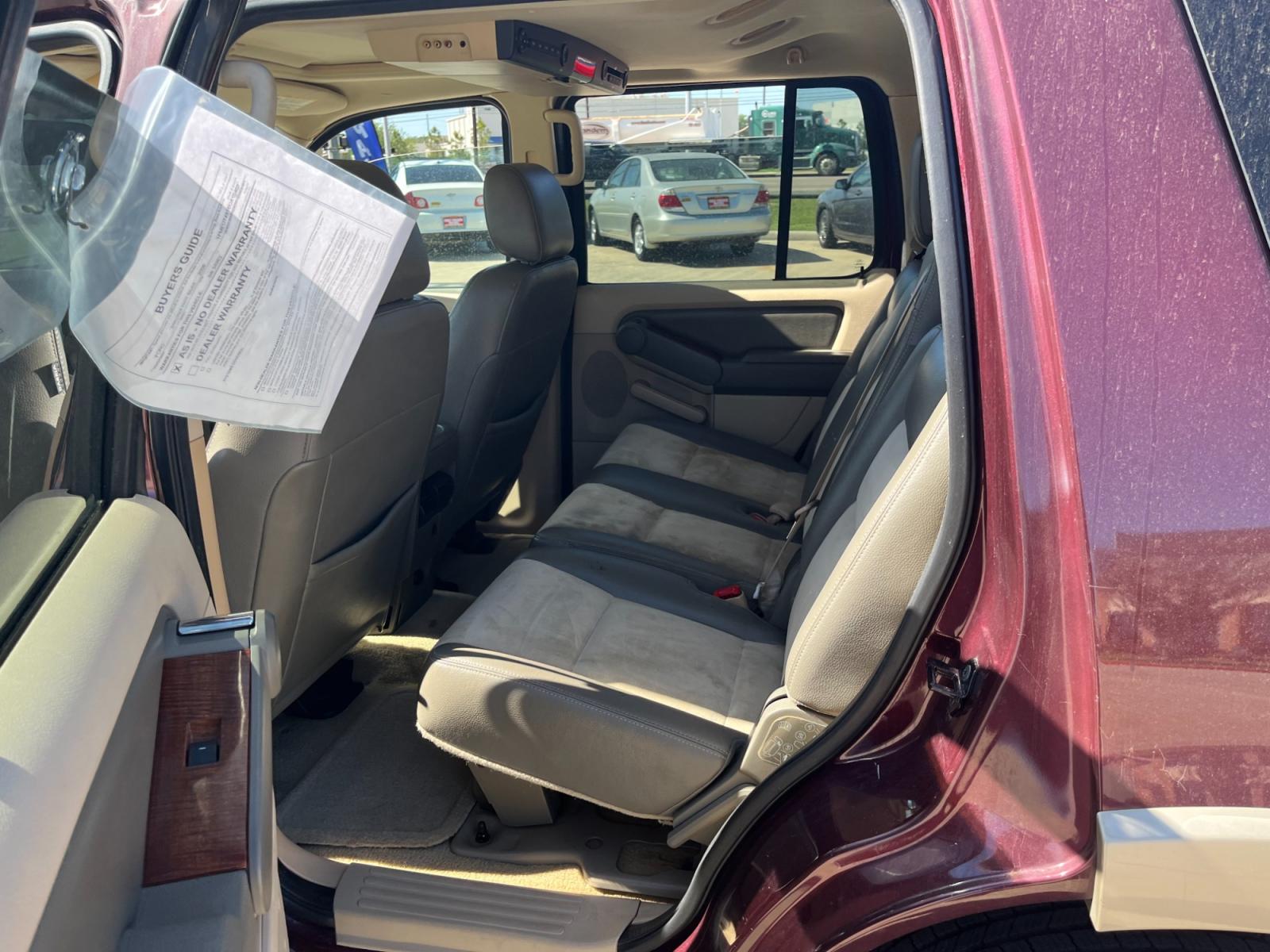 2006 maroom /TAN Ford Explorer Eddie Bauer 4.6L 4WD (1FMEU74816U) with an 4.6L V8 SOHC 16V engine, 6-Speed Automatic Overdrive transmission, located at 14700 Tomball Parkway 249, Houston, TX, 77086, (281) 444-2200, 29.928619, -95.504074 - Photo #9